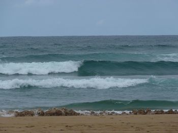 Scenic view of sea against clear sky