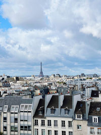 High angle view of buildings in city against sky paris