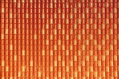 Full frame shot of orange brick wall