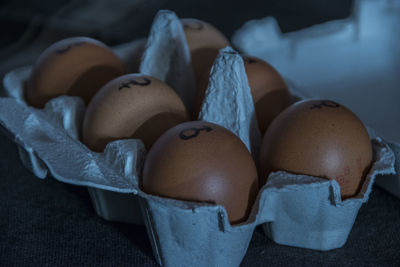 High angle view of eggs in container