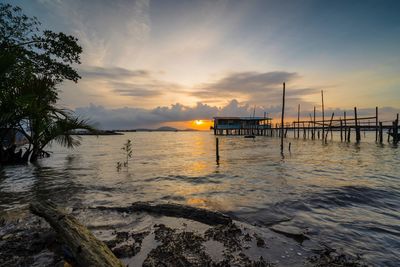 Scenic view of sea against sky during sunset