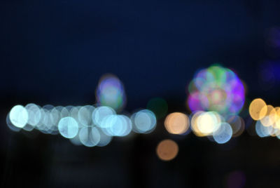 Defocused image of illuminated lights at night