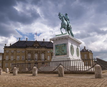 Statue frederick v by jacques francois joseph saly, amalienborg palace square,  copenhagen, denmark