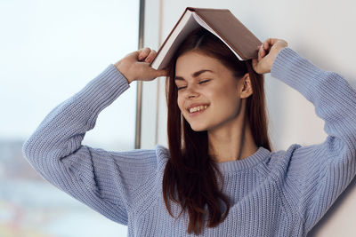 Portrait of smiling young woman