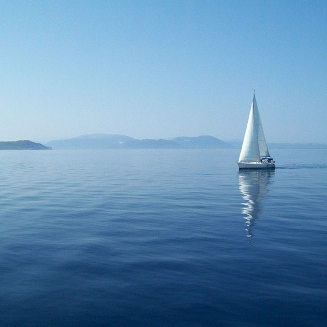 nautical vessel, water, transportation, boat, sea, mode of transport, waterfront, clear sky, tranquil scene, tranquility, blue, copy space, scenics, sailing, beauty in nature, sailboat, nature, rippled, travel, horizon over water