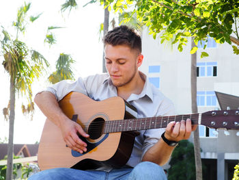 Young man playing guitar