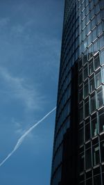 Low angle view of skyscraper against sky