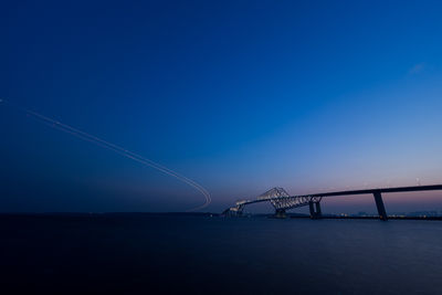 View of suspension bridge at night