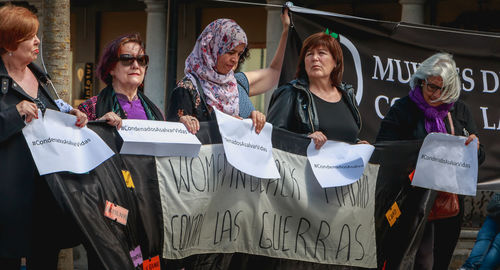 Group of people against the wall