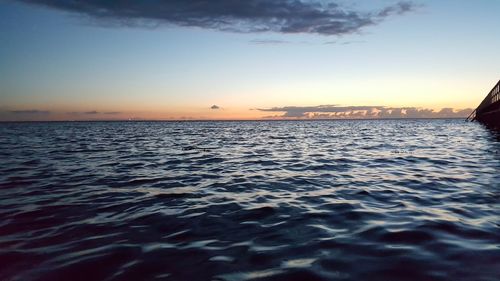 Scenic view of sea at sunset