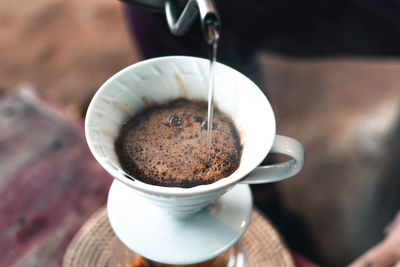 Close-up of coffee cup on table