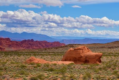 Rock formations on landscape against sky