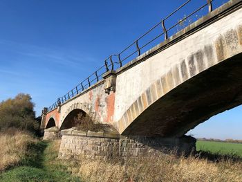 Low angle view of bridge against sky