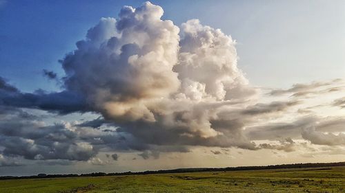 Scenic view of land against sky