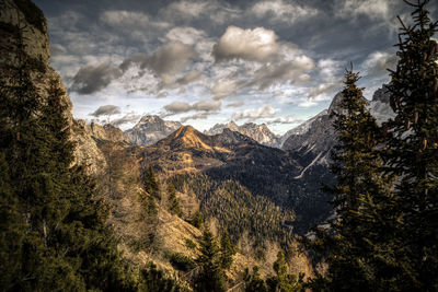 Scenic view of mountains against sky at sunset