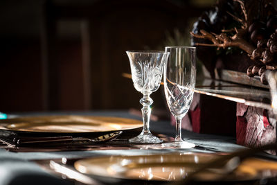 Close-up of glasses on dining table