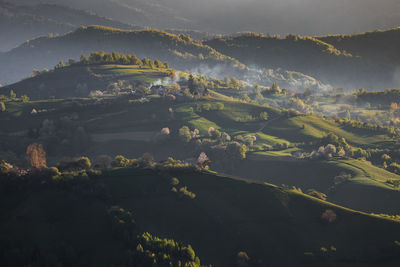 Aerial view of landscape and mountains against sky