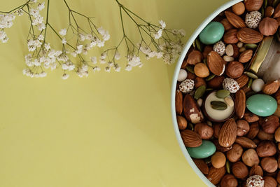 Directly above shot of food in bowl on pink background