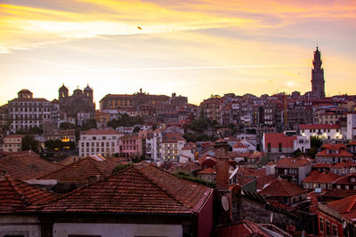 Cityscape against sky during sunset