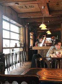 High angle view of people sitting in restaurant