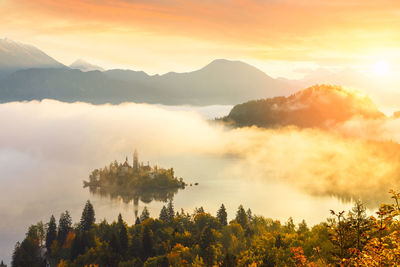 Scenic view of mountains against sky during sunset