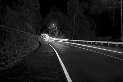 Light trails on road at night