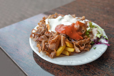 Close-up of food in plate on table