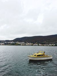 Boat in sea against sky