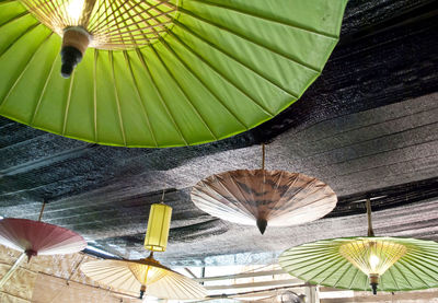 Low angle view of umbrellas at ceiling