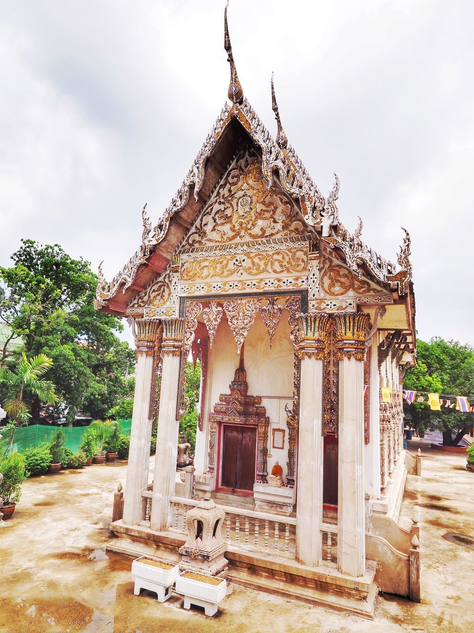 TEMPLE AGAINST BUILDING