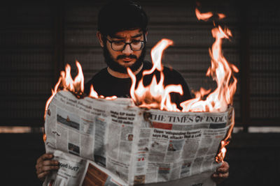 High angle view of man with text on paper