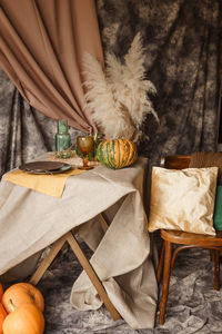 Autumn interior. a table covered with dishes