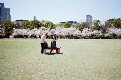 People in park against sky