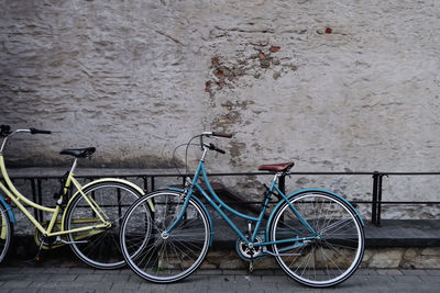 Bicycle leaning on wall