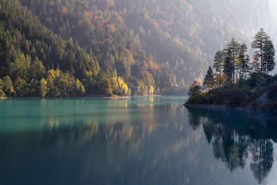 Scenic view of lake against sky during autumn