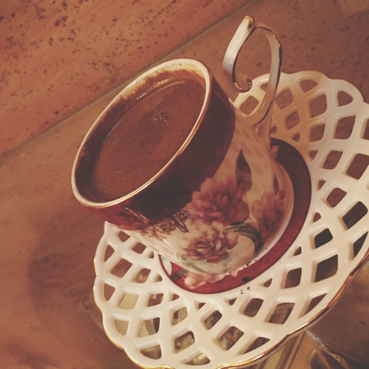 food and drink, indoors, table, drink, freshness, still life, high angle view, refreshment, food, coffee cup, coffee - drink, plate, ready-to-eat, spoon, directly above, serving size, sweet food, cup, indulgence, breakfast