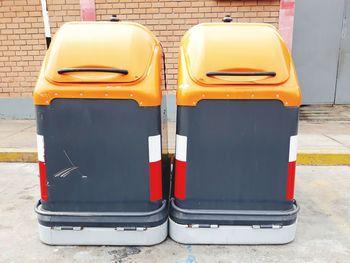 Close-up of empty seats on footpath