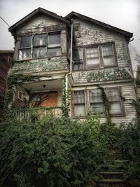 Low angle view of old building against sky