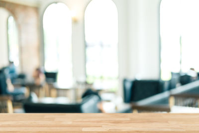 Close-up of empty seats on table in restaurant