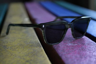 Close-up of sunglasses on table