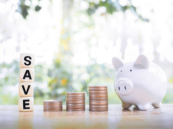 Close-up of coins on table