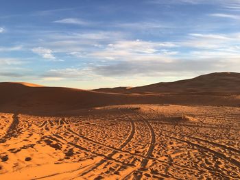 Scenic view of desert against sky