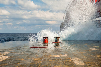 Waves and breakwater at the st. elmo bridge