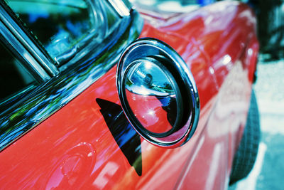 High angle view of car on side-view mirror