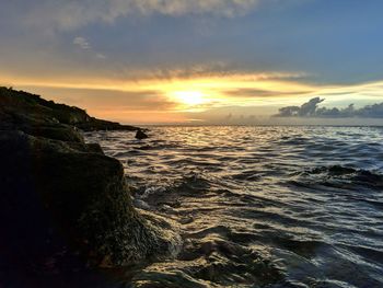 Scenic view of sea against sky during sunset
