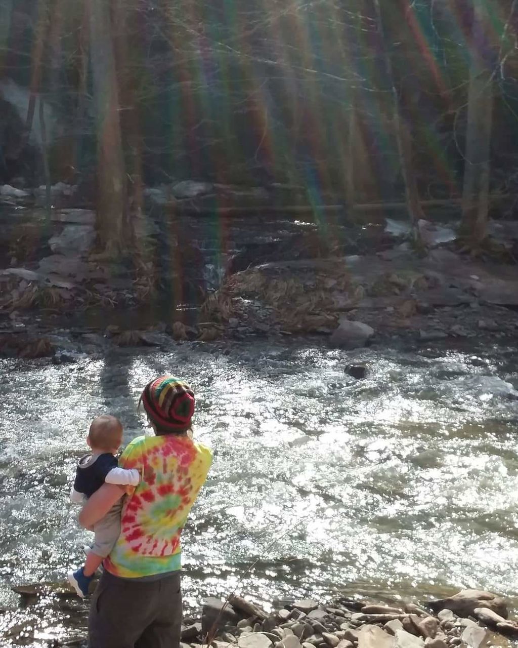 child, childhood, real people, land, nature, leisure activity, day, water, standing, lifestyles, people, men, three quarter length, two people, sunlight, girls, boys, outdoors, positive emotion, innocence, flowing water