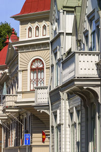 Low angle view of buildings in city against sky
