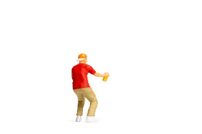 Rear view of man standing against white background