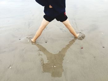 Low section of man on beach