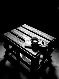 High angle view of man sitting on table